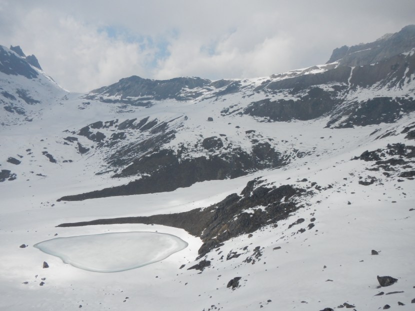 Looking towards the Lumbha Sumba Pass (5130m).  The route too it though was knee deep snow.